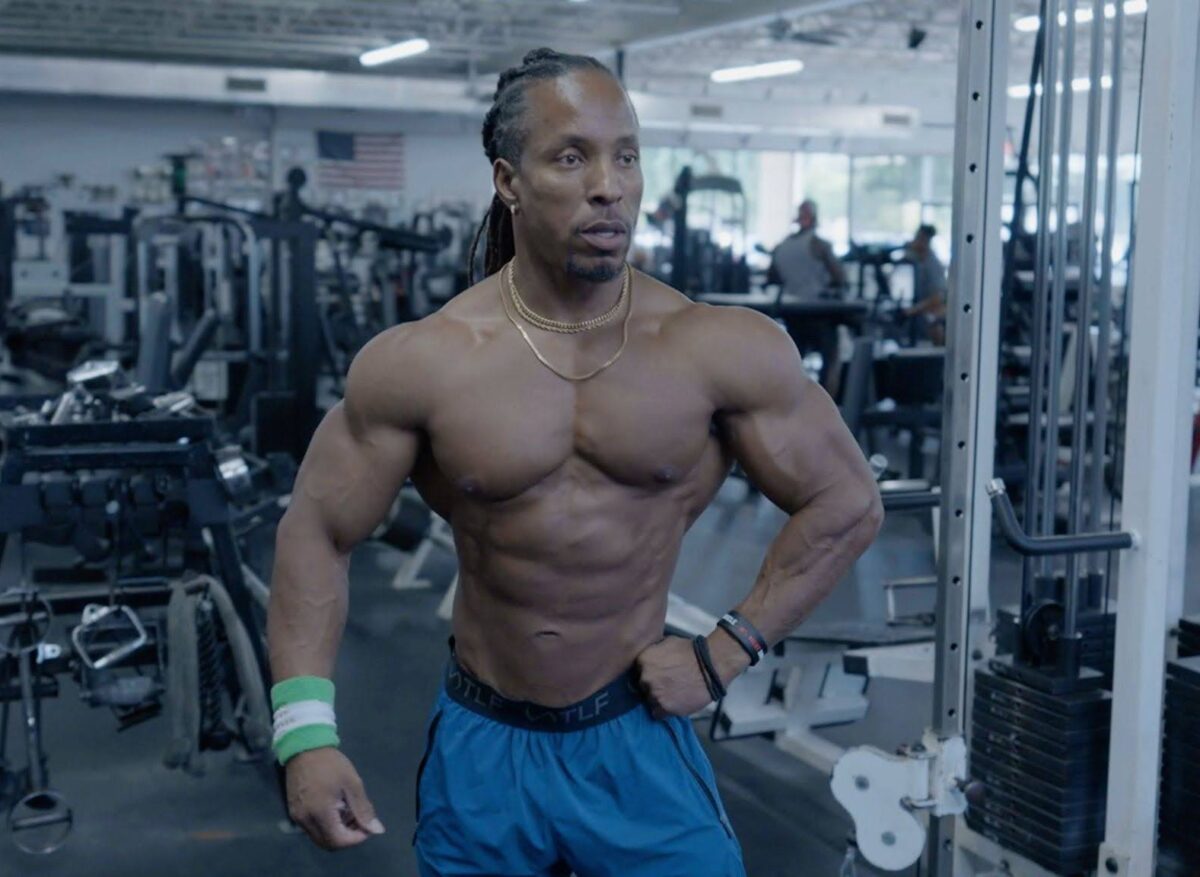 Vegan physique athlete training in a gym
