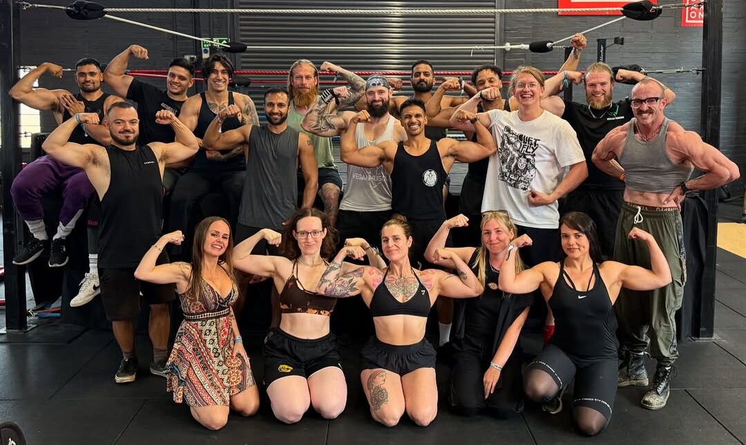 Group of vegan athletes posing together